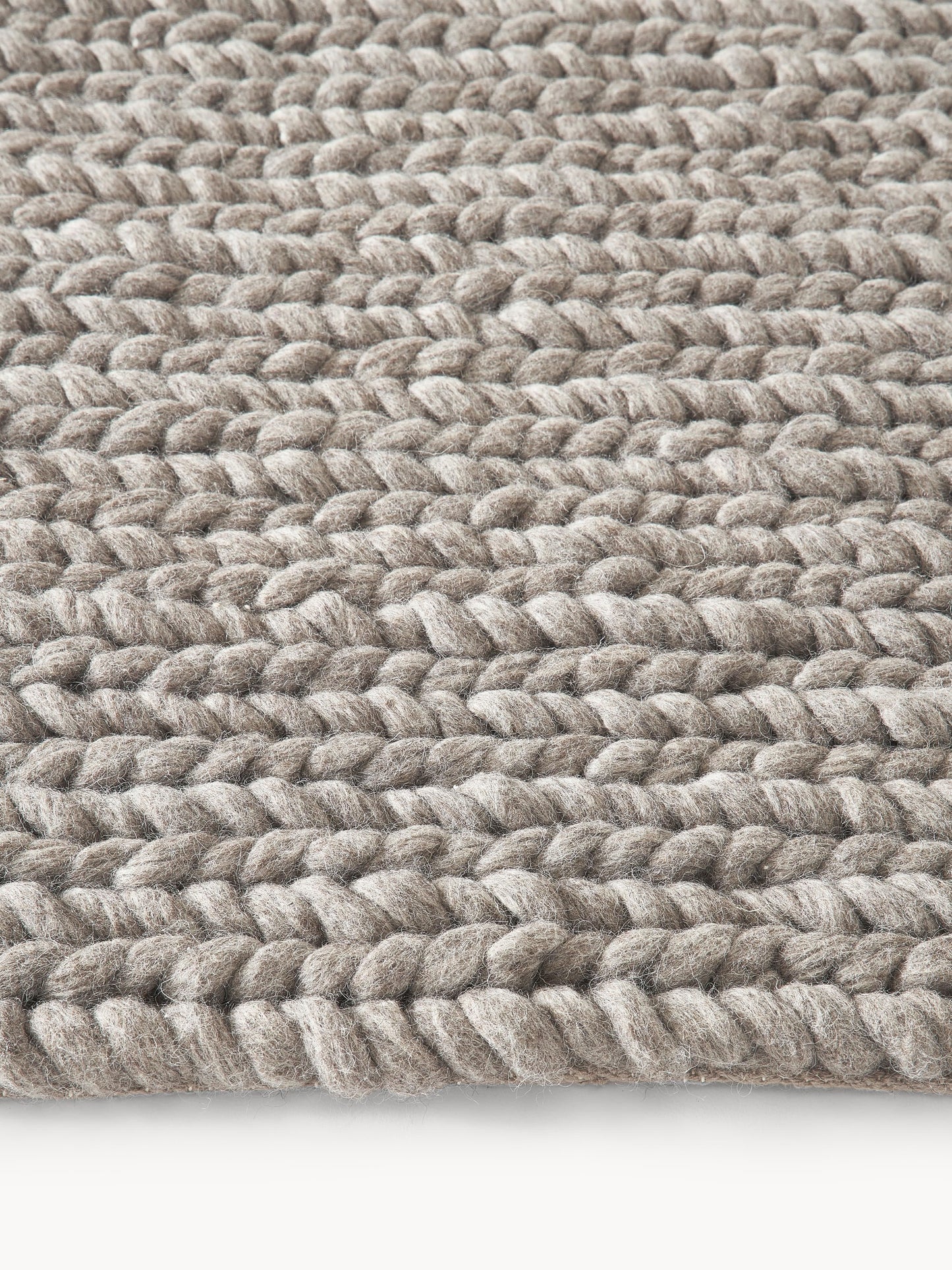 Brunola Wool Rug, Handmade, with Braided Texture