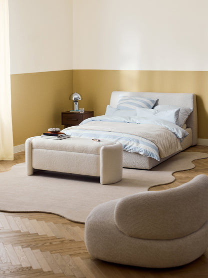 Cloveran Upholstered Bed in Bouclé