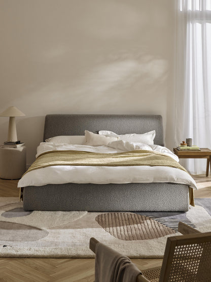 Cloveran Upholstered Storage Bed in Bouclé
